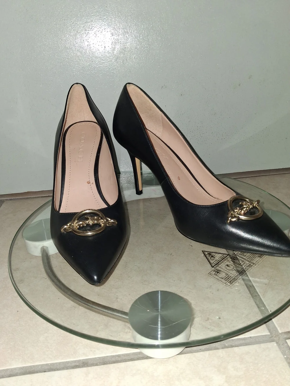 Coach Black Women's Pointed Toe Pumps with Gold Accent
